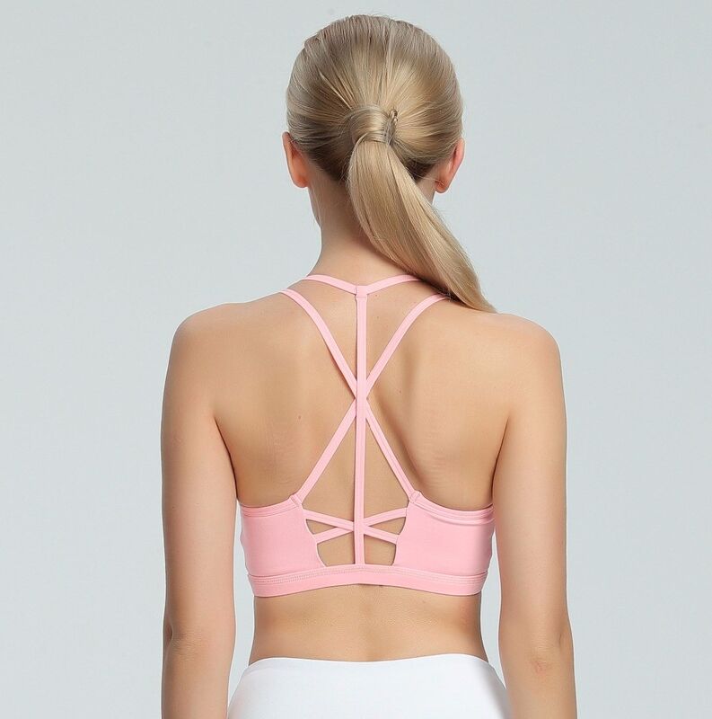 Wholesale stylish gym bra strappy back strip ultimate sports bra
